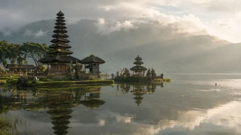 Bali water temples - lakeside temple shrine reflected in misty water